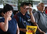 韓国労組委員長に懲役５年　警察の放水銃には免罪符