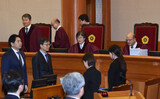 朴大統領代理人団、「ろうそく集会の背後に北の主体思想」と“色分け論”を展開