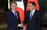 文大統領と李克強中国首相「早期に正常軌道に回帰できるよう最善尽くす」