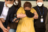 同居男性の９歳の息子をカバンに監禁し殺害した女性、控訴審で懲役２５年＝韓国