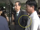 ハン前首相、腕を抑えられ特検行き…「大統領を夢見たなんてあきれ返る」
